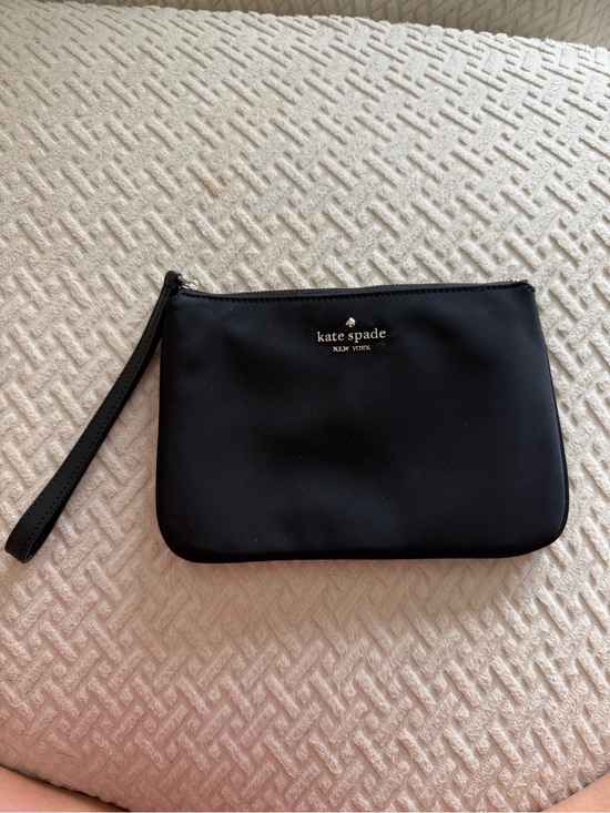 kate spade Handbags - kate spade Black Zip Wristlet with Gold Logo